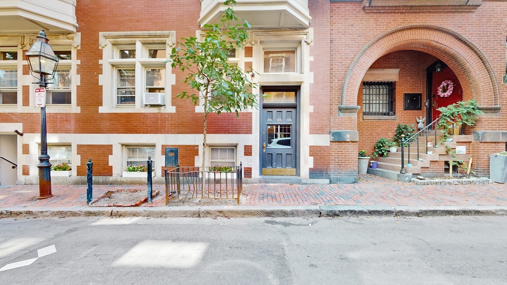 a front view of a multi story residential apartment building