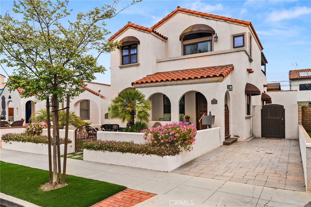 Photo showing a single parking space in front of the home.