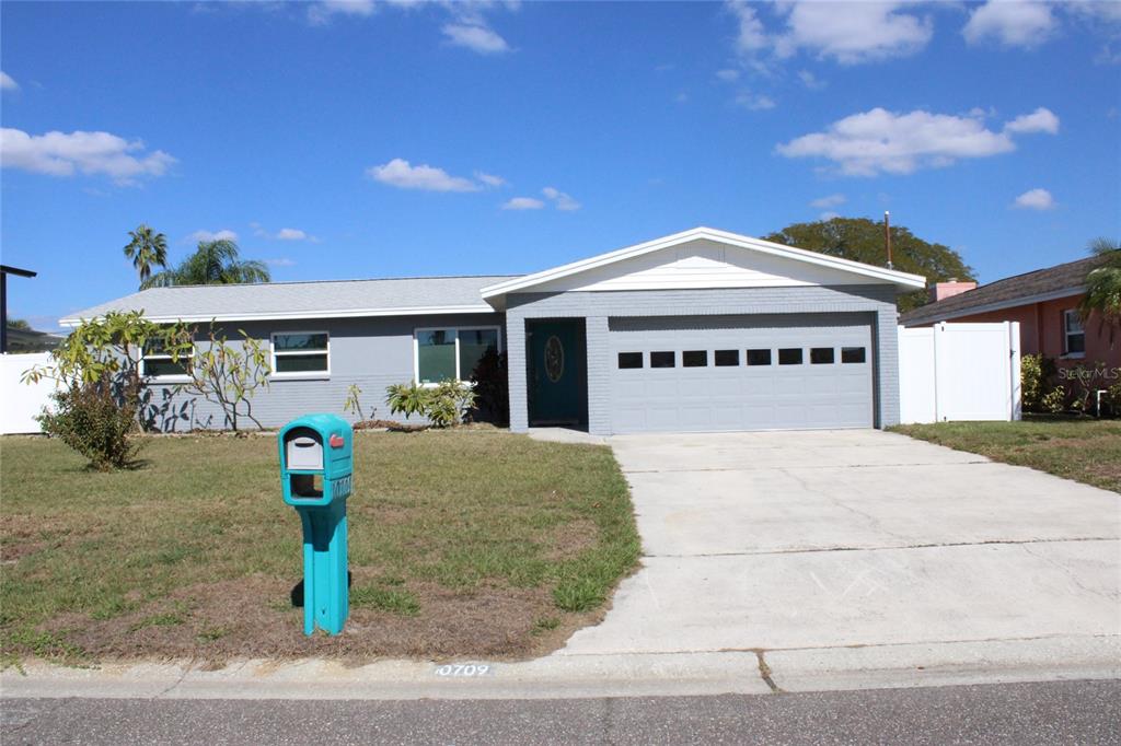 a front view of a house with a porch