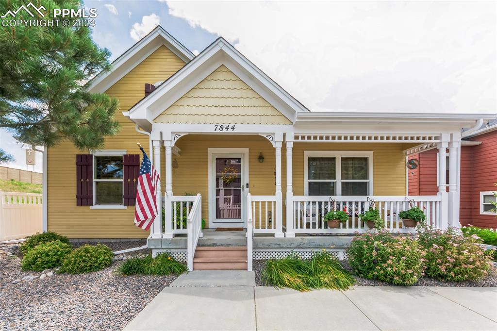 a front view of a house with a porch