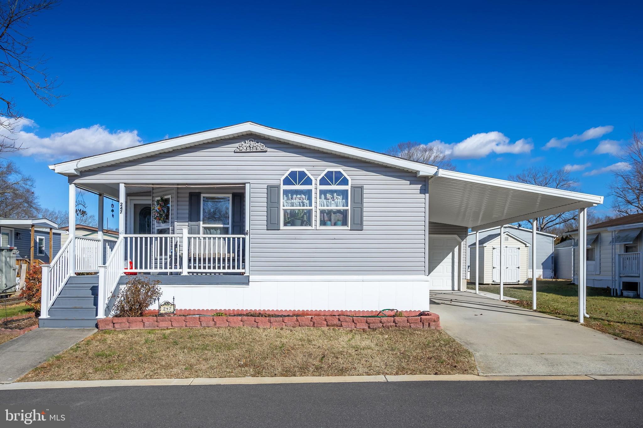 a front view of a house with garage