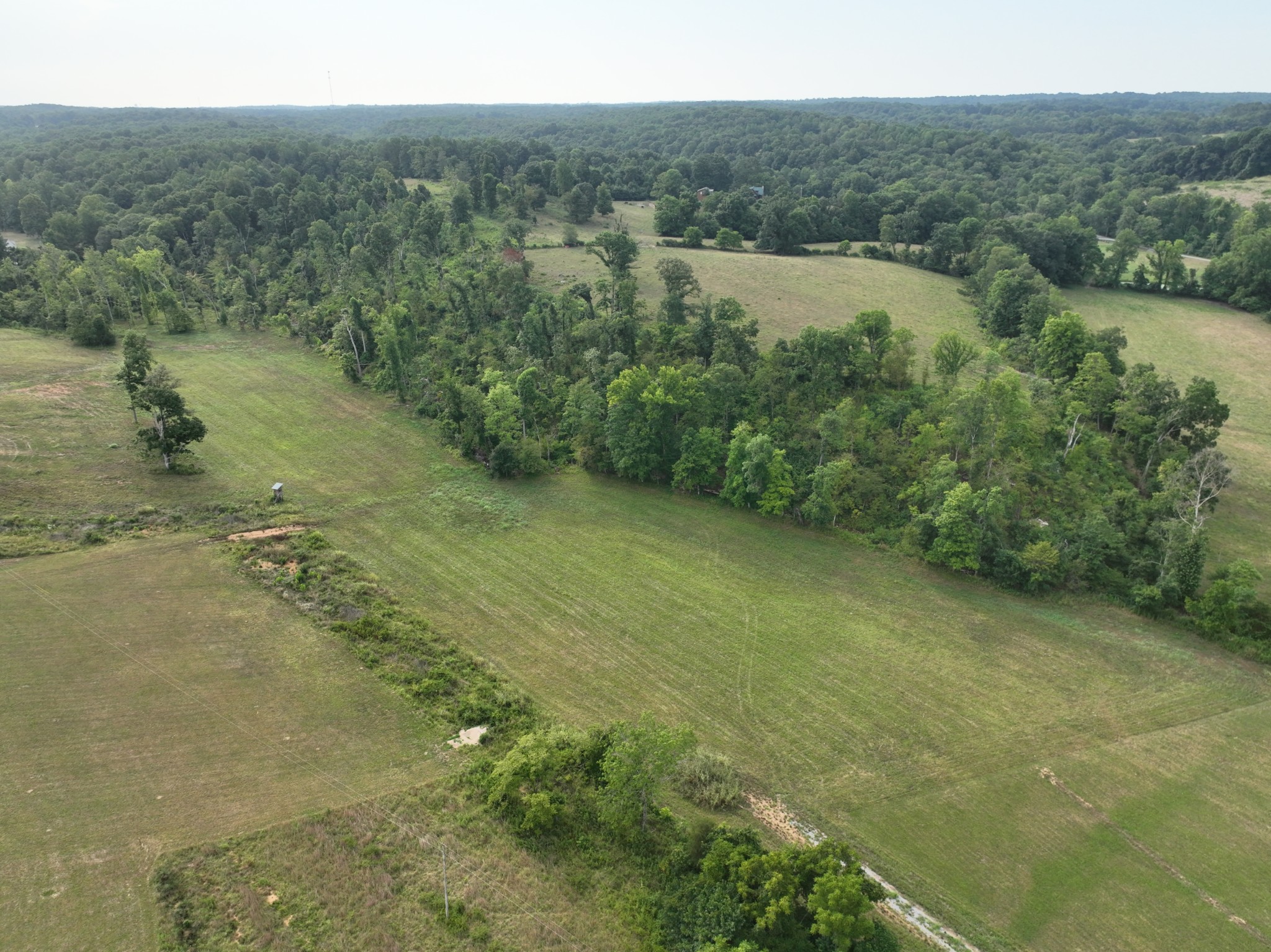 a view of a field with an outdoor space