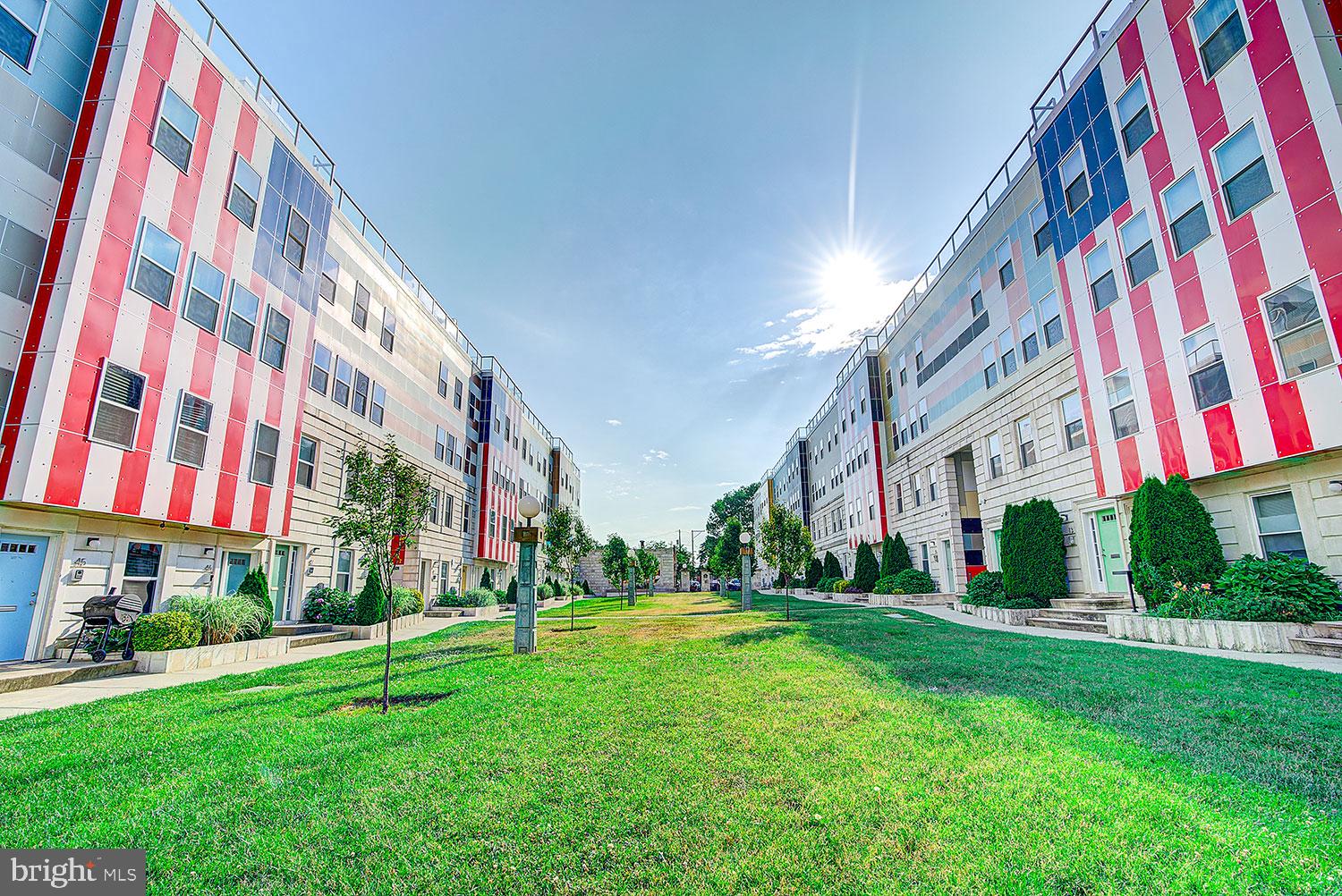 a view of building with yard