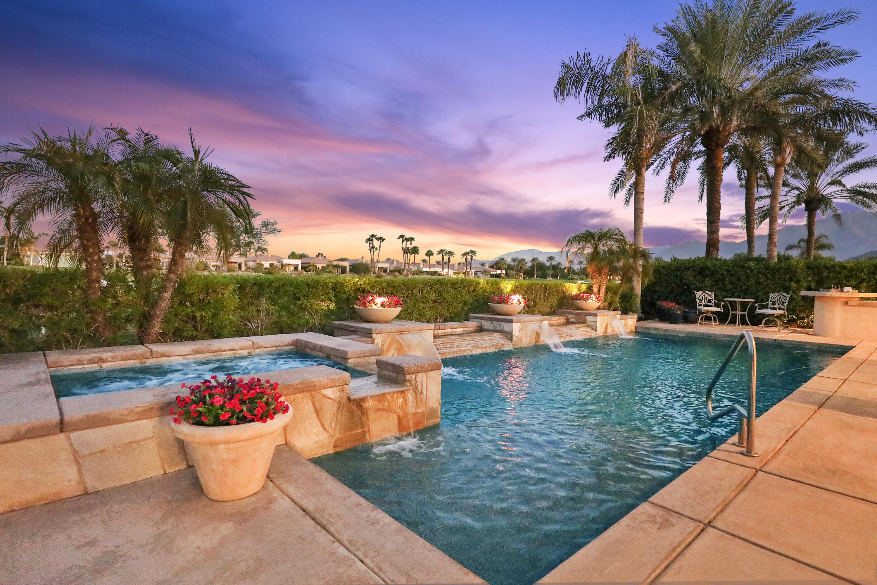 a view of a swimming pool with a patio