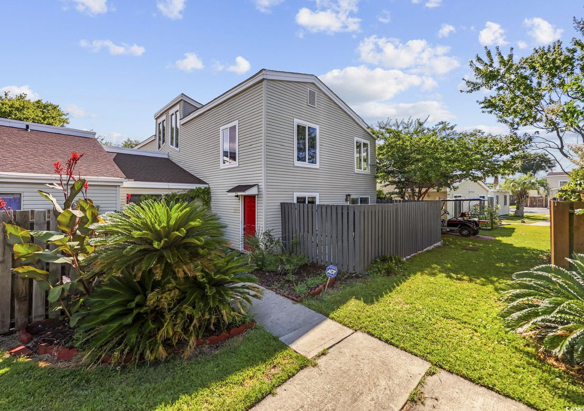 Exterior space with a yard