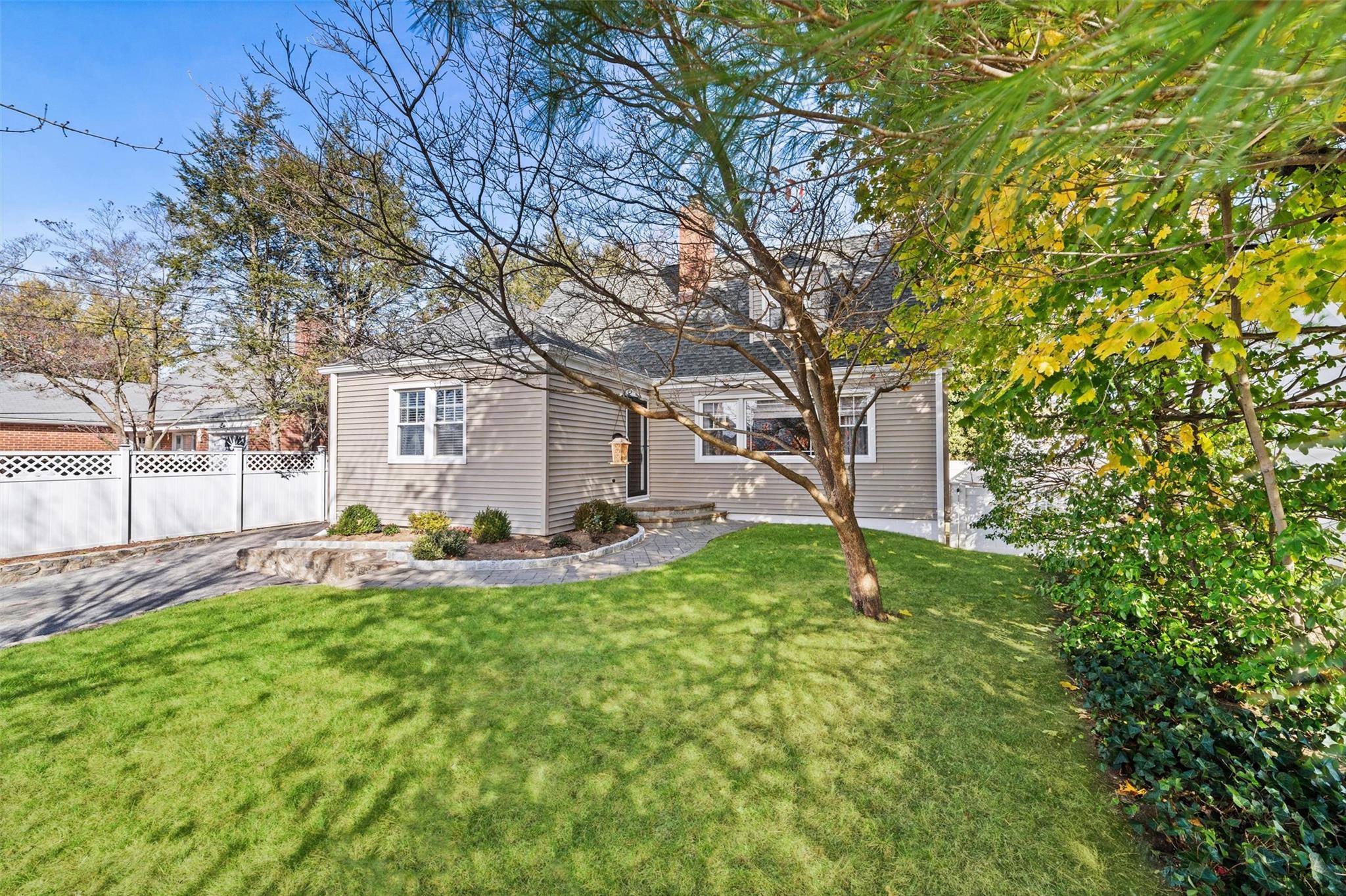 front view of a house with a yard