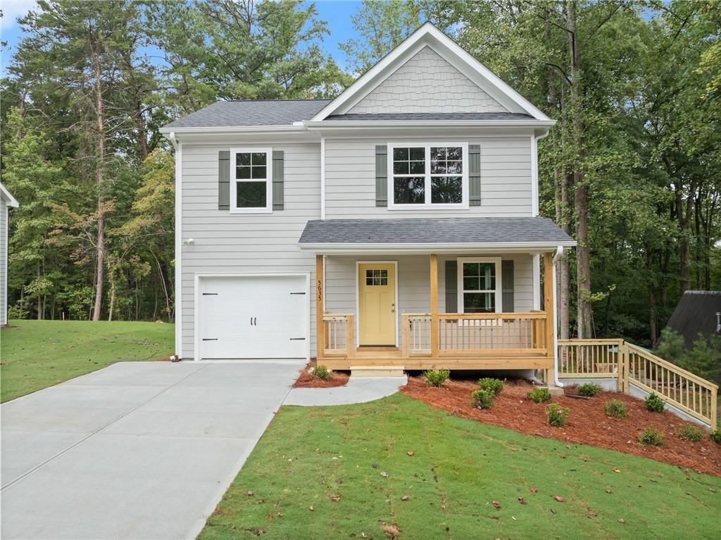 a front view of a house with yard