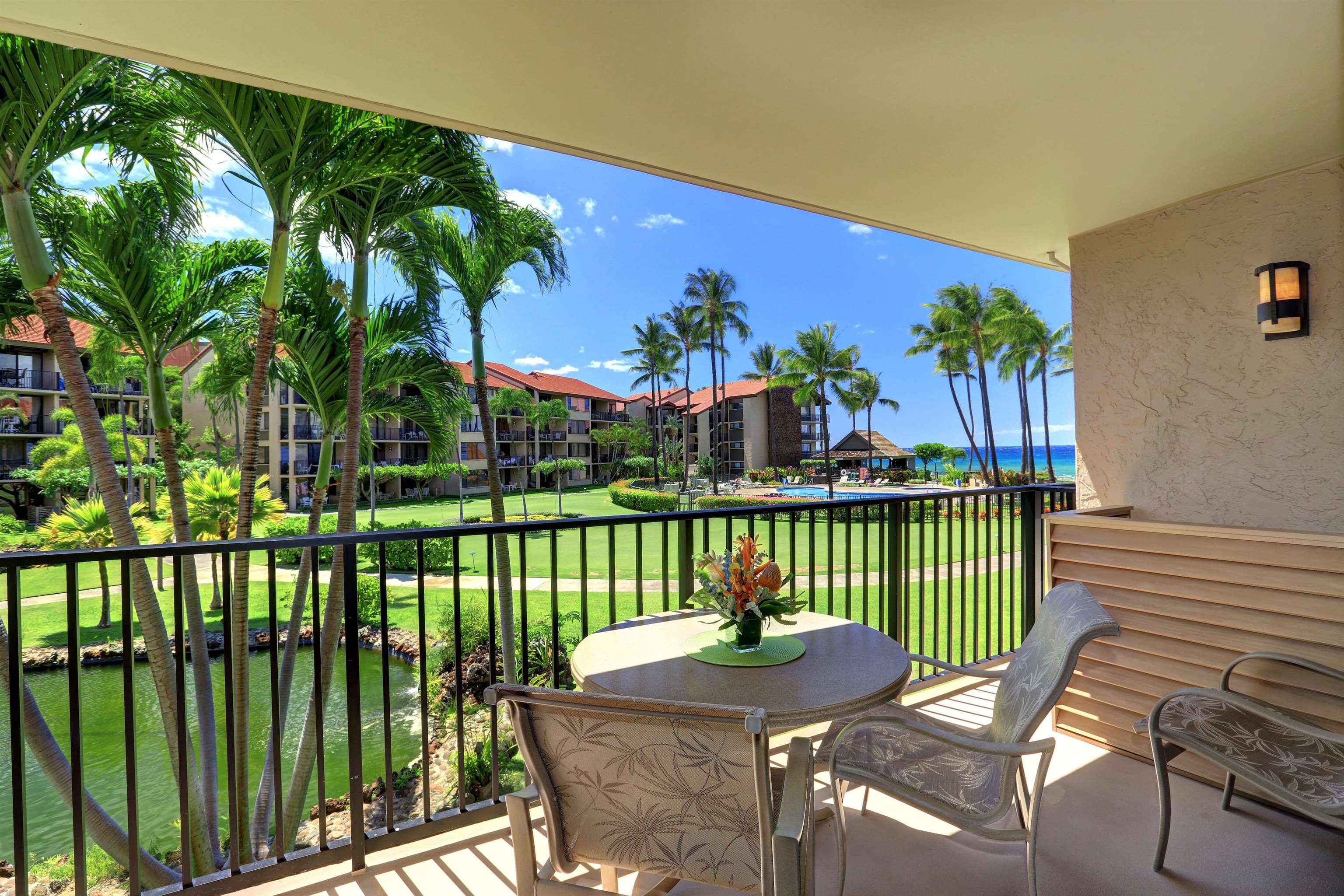 a view of a chairs and table in patio