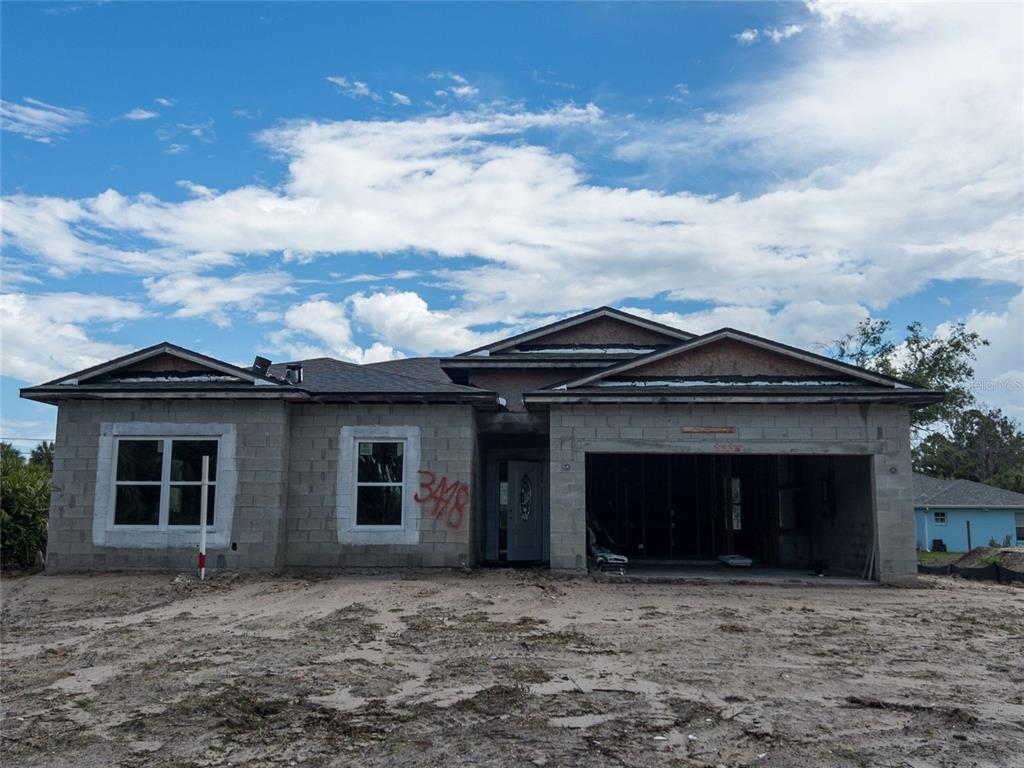 front view of a house with yard