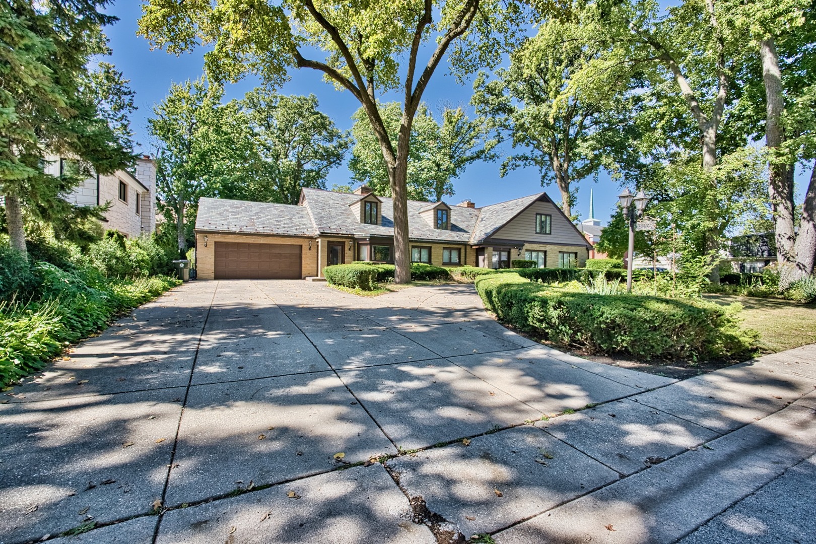 a front view of a house with yard