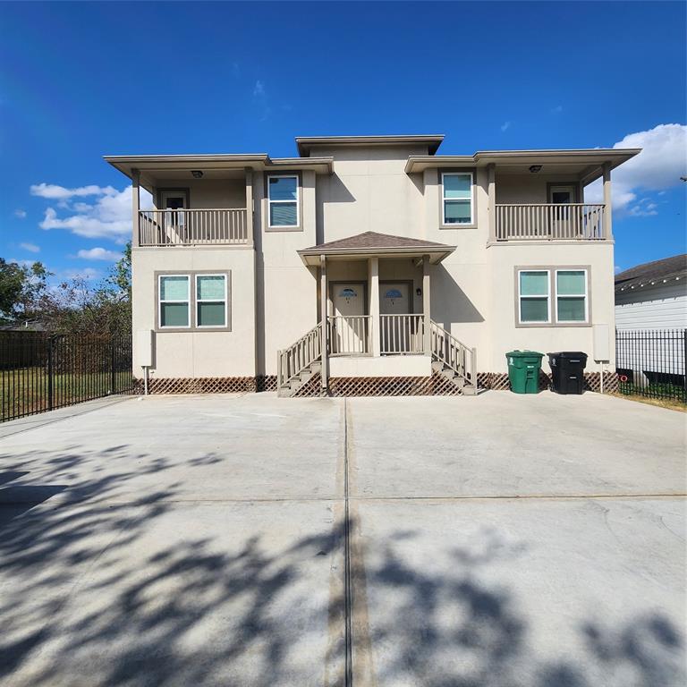 a front view of a house with a garage