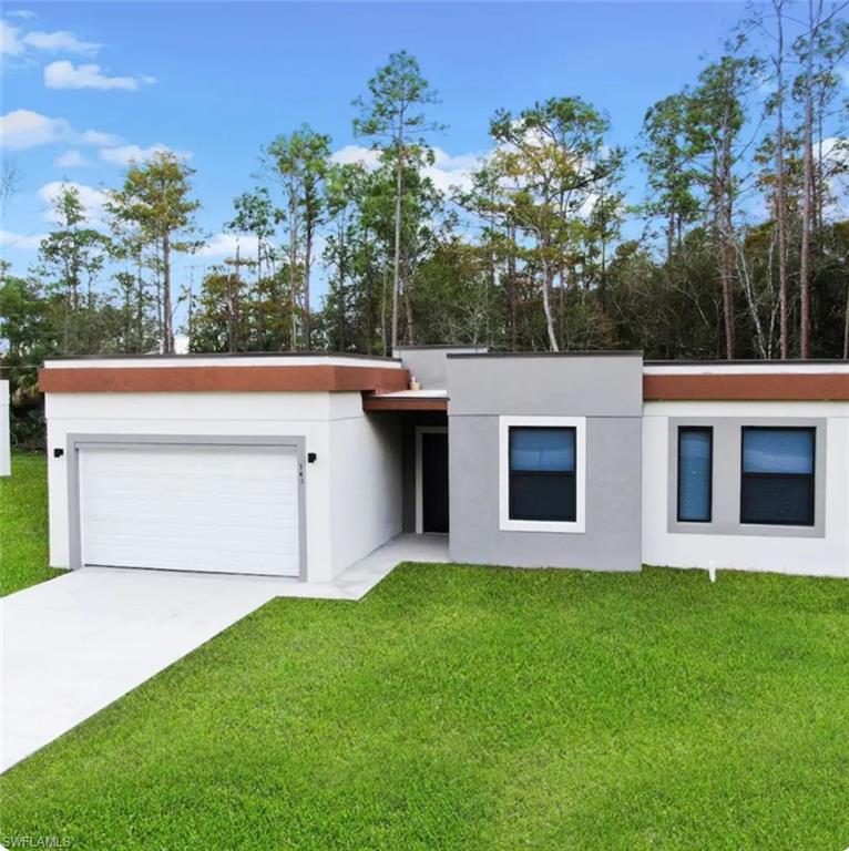 a view of house with yard