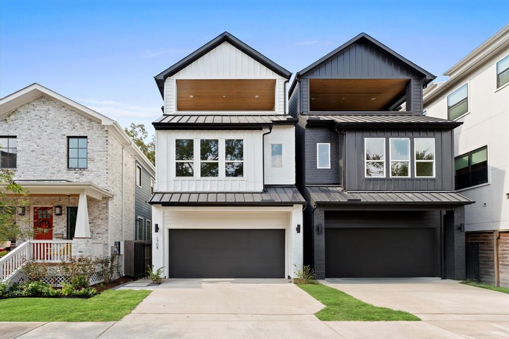 a front view of a house with yard