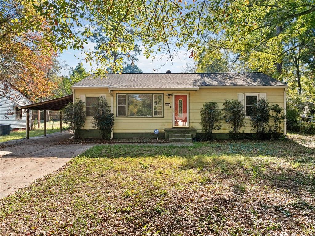 front view of a house with a yard