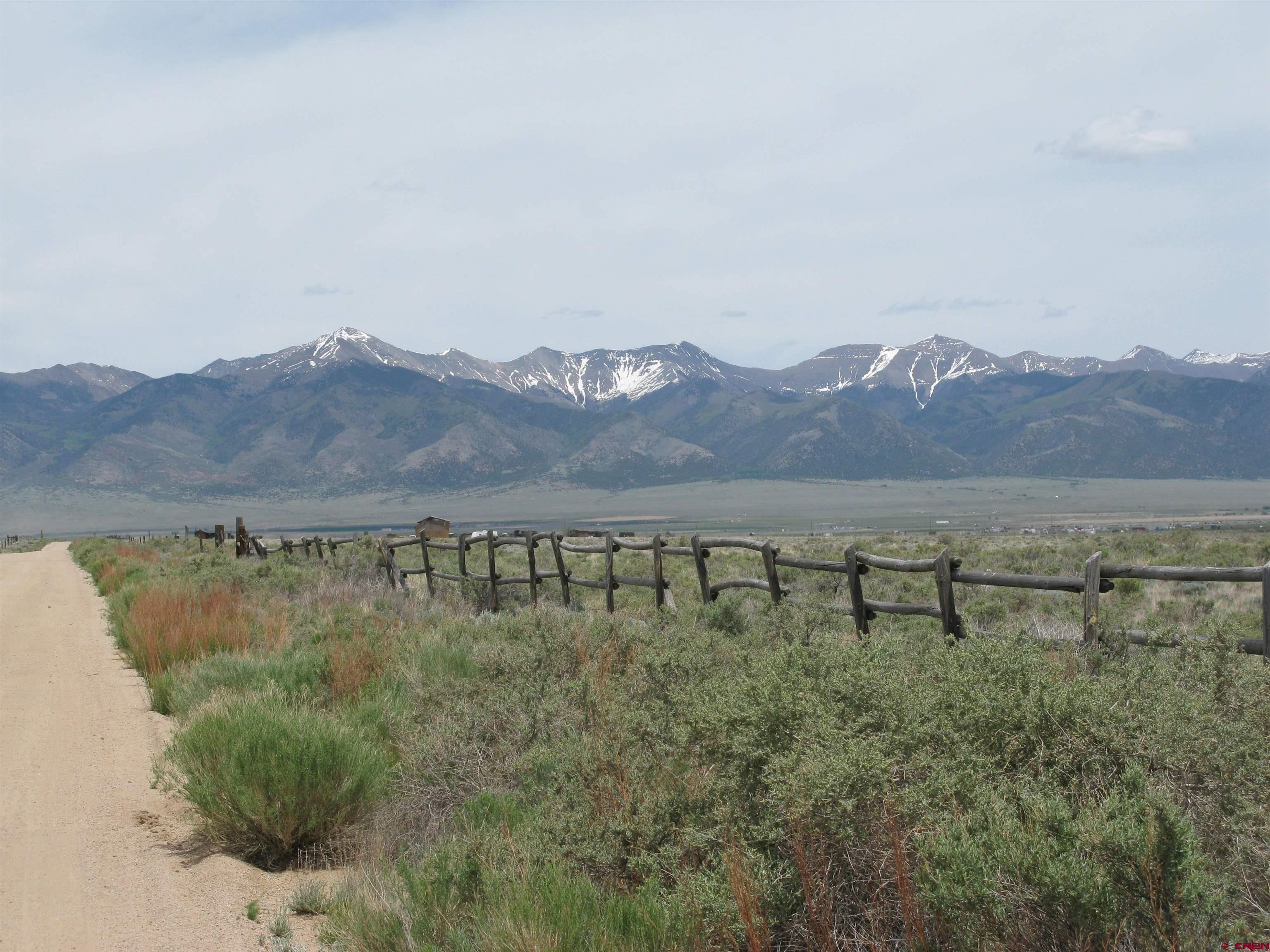 a view of a lake with mountains in the background