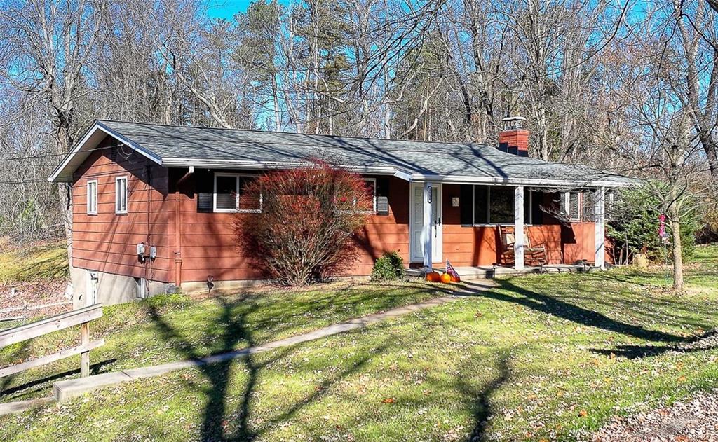 front view of house with a yard