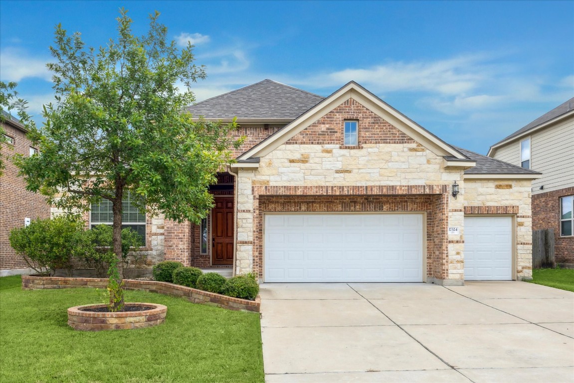 a view of a house with a sink and yard