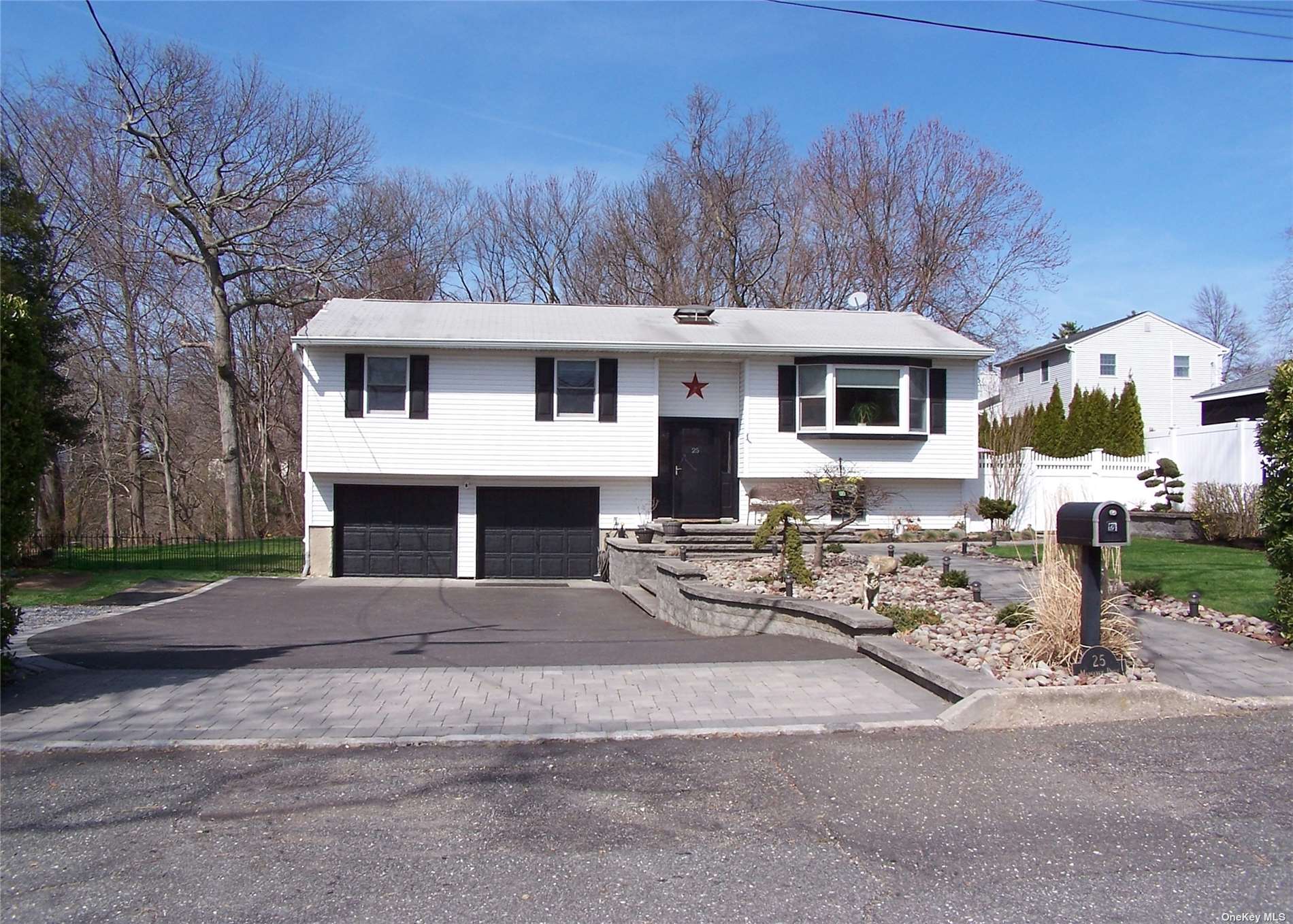 a front view of a house with yard