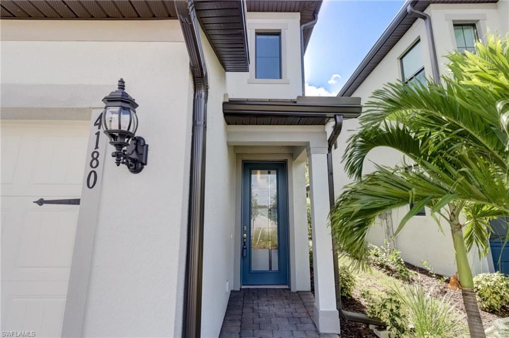 Property entrance with a garage