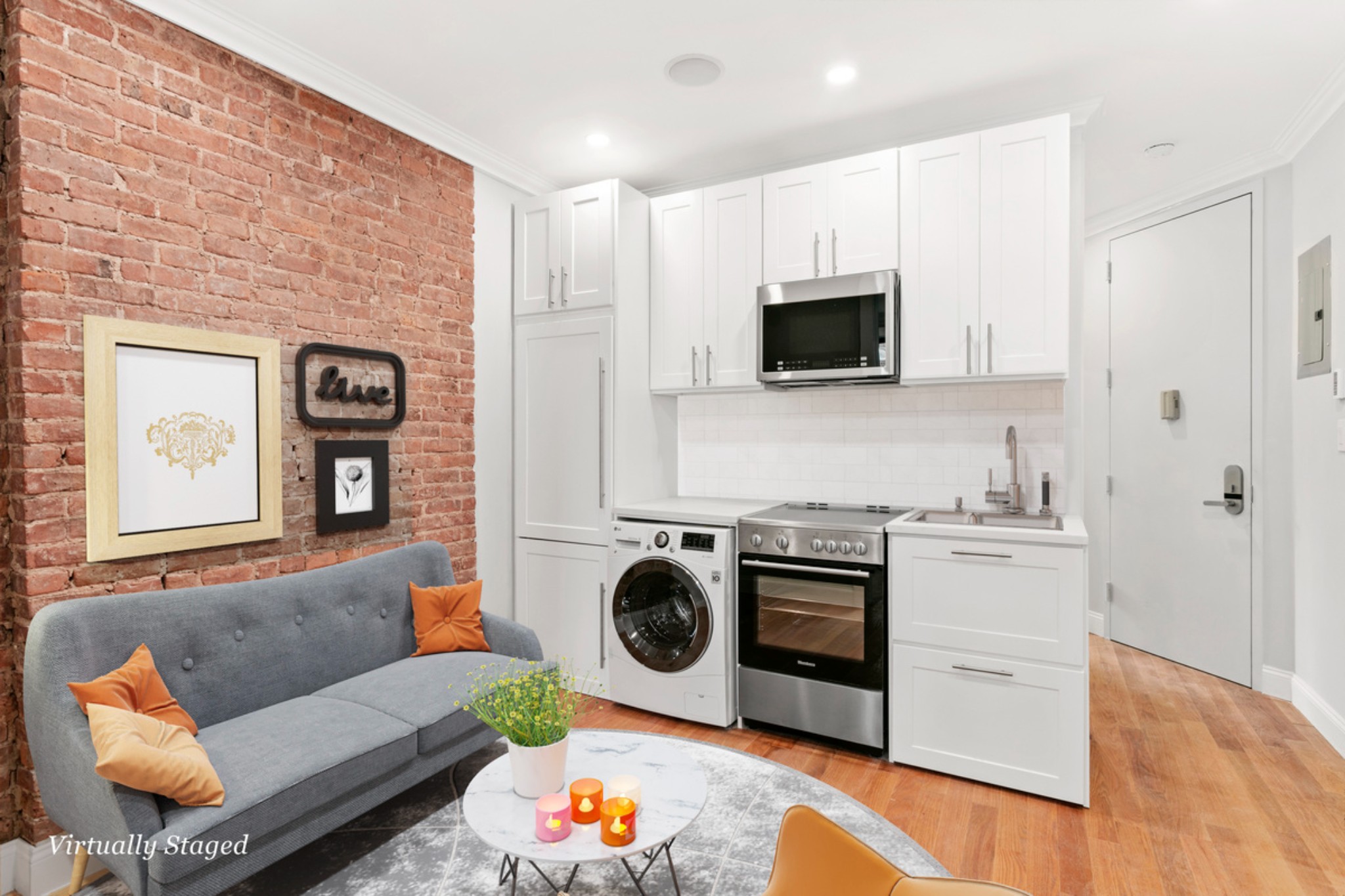 a kitchen with stainless steel appliances granite countertop a stove and a microwave