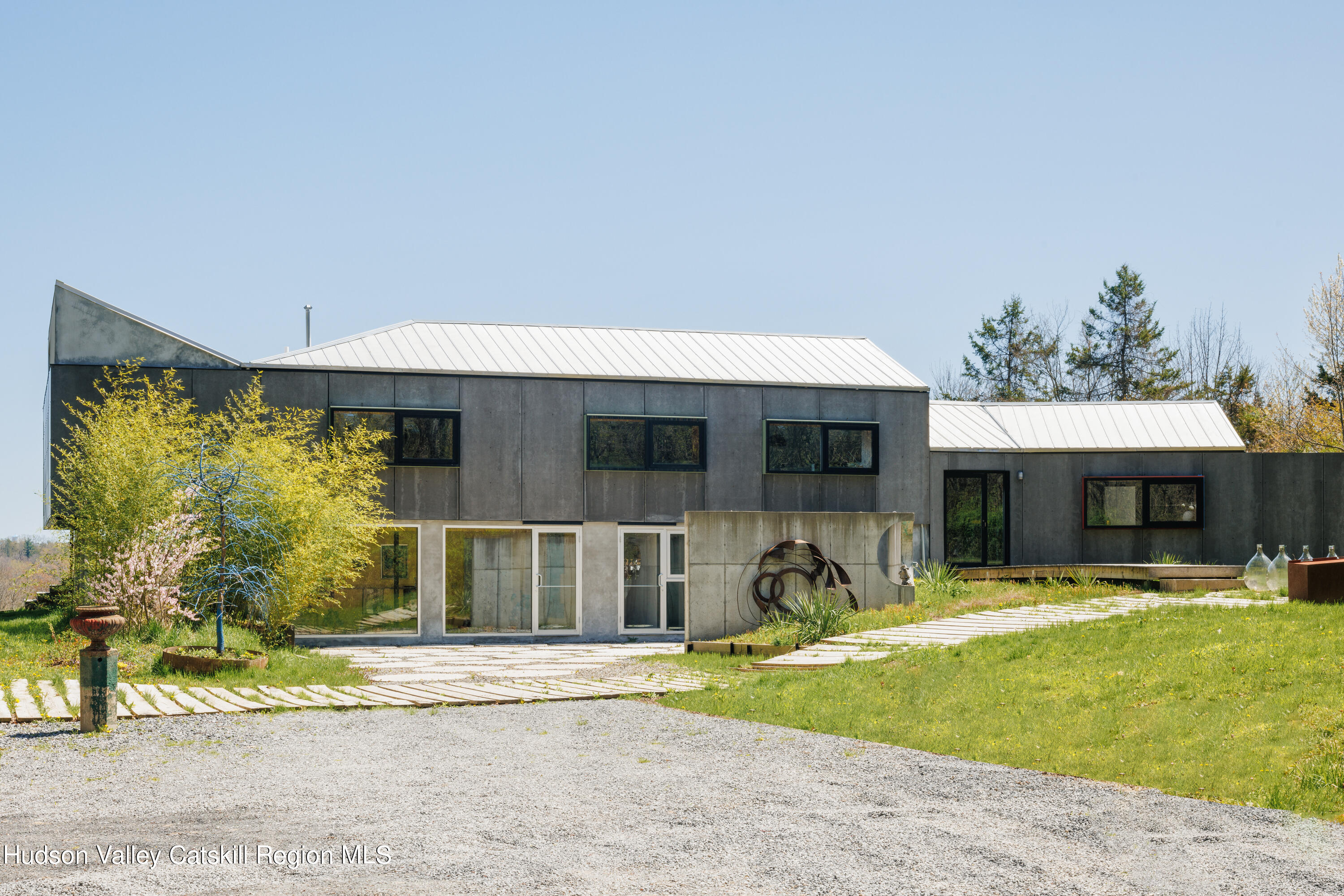 a view of a house with outdoor space and porch