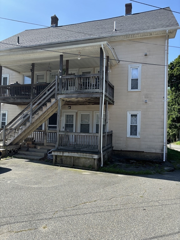 a view of a building with a street