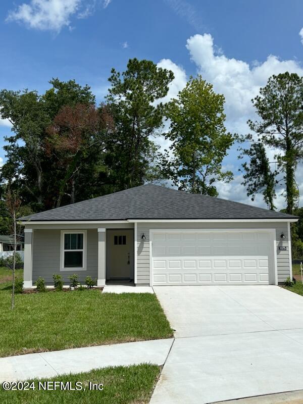 front view of a house with a yard