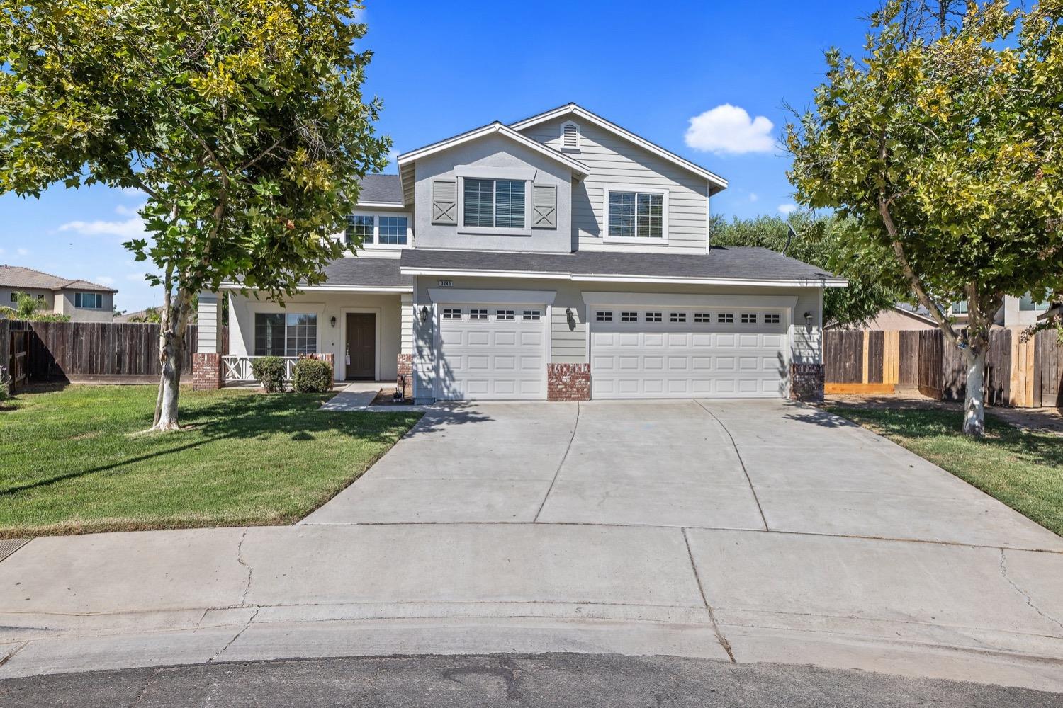 a view of house and outdoor space with yard