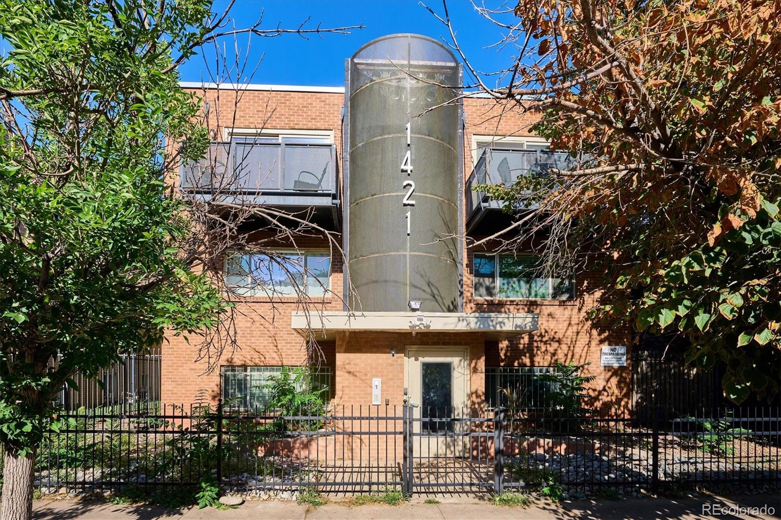 a front view of a house with a outdoor space