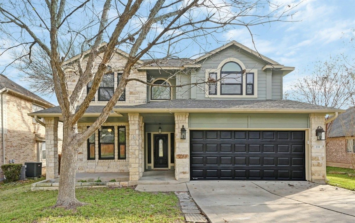 a view of a large house with a large windows