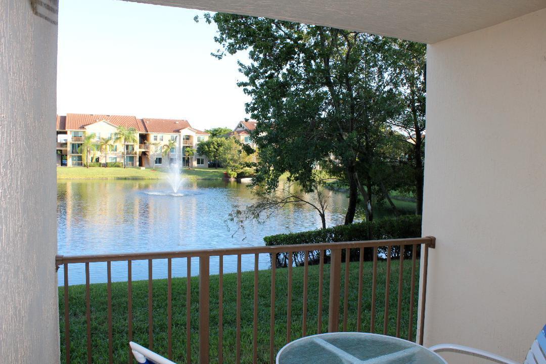 a view of a balcony with lake view