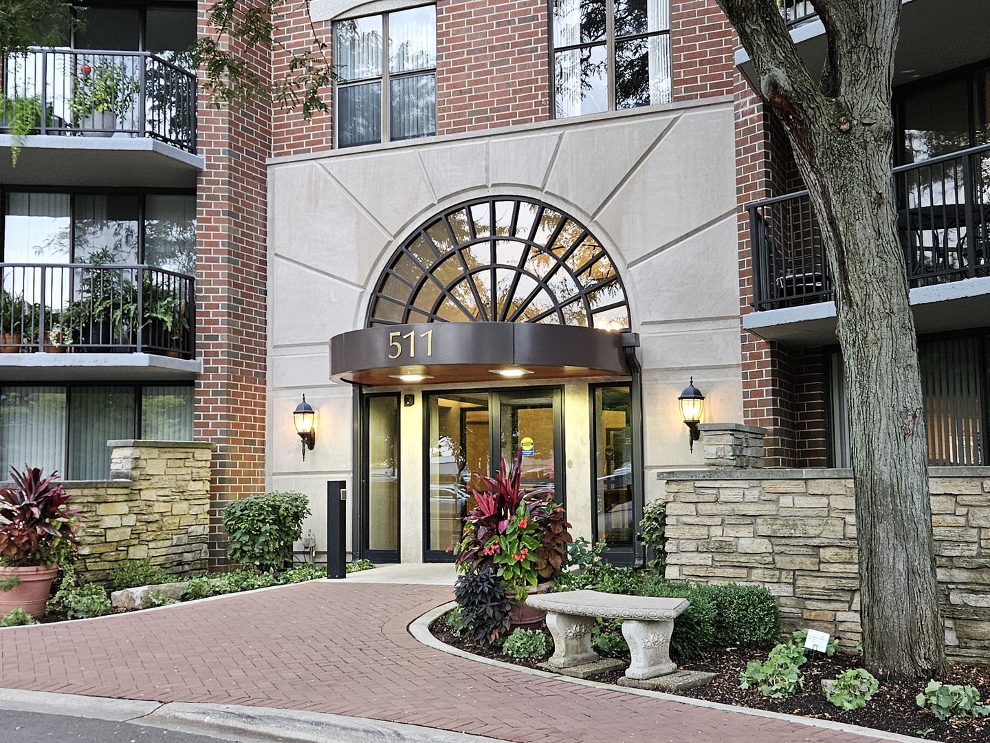 a view of a building with a potted plant