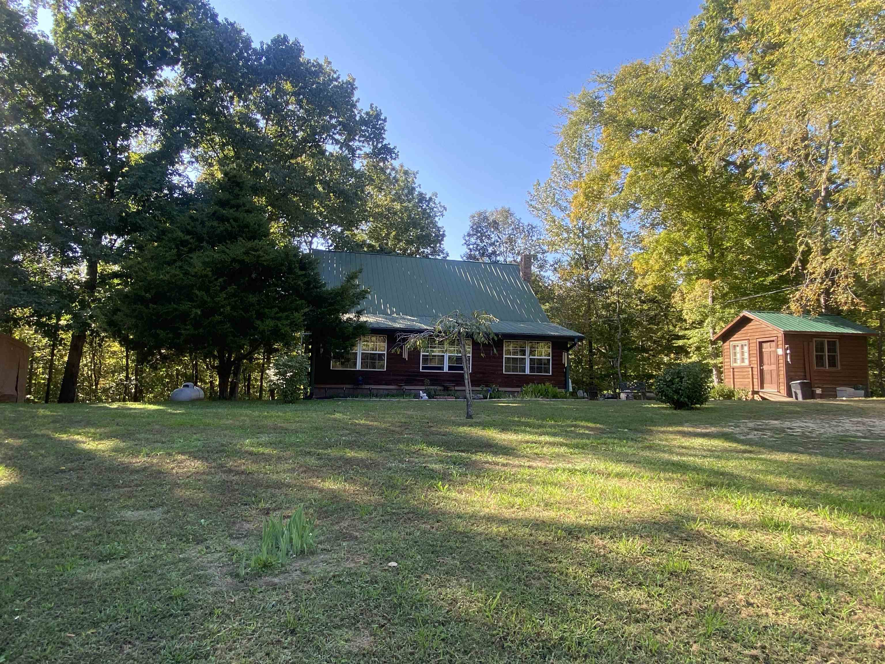 a view of a house with a big yard