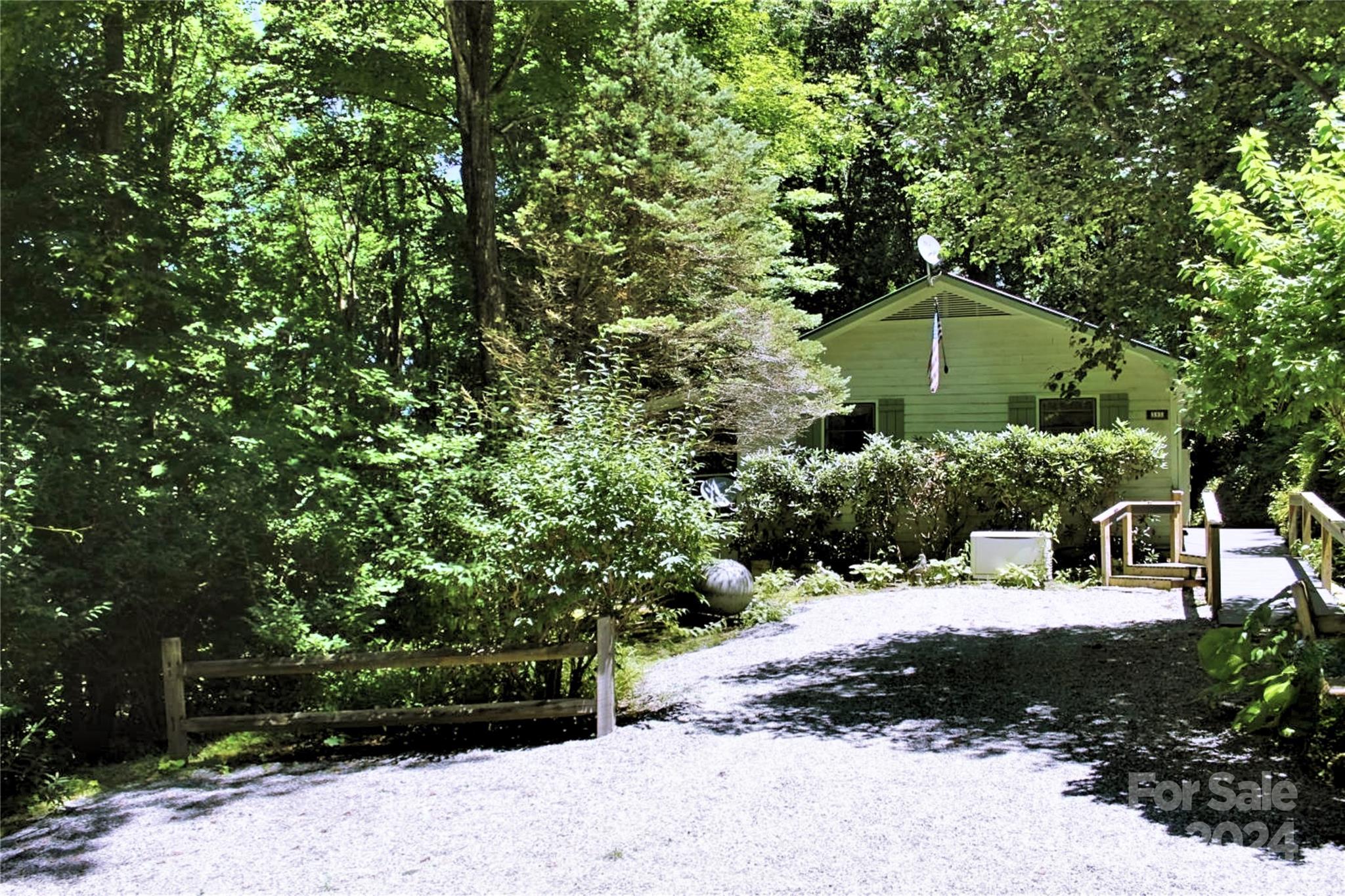 a view of a garden with a bench