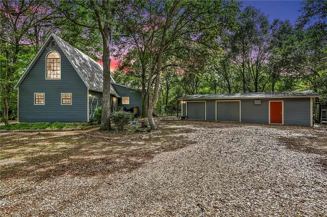 front view of a house with a trees