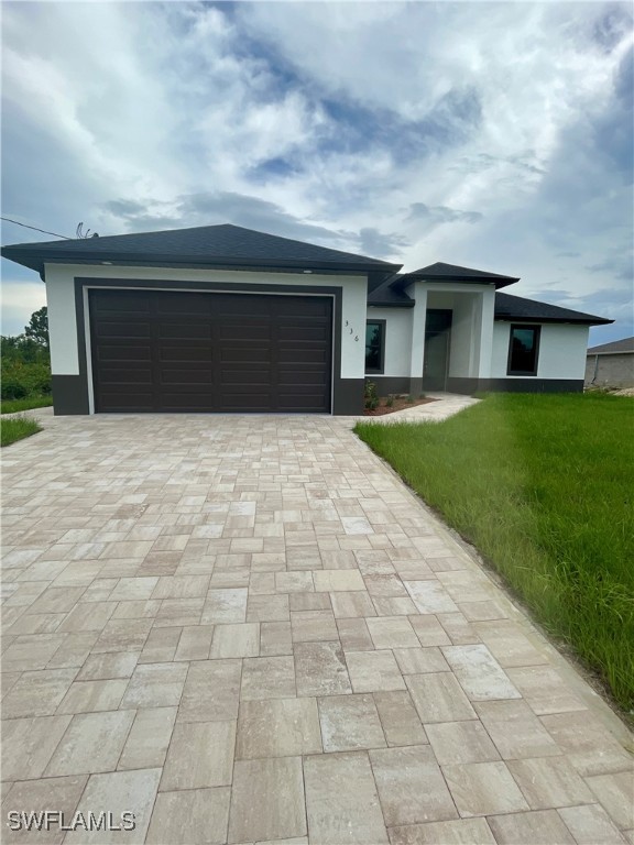 a front view of house with yard