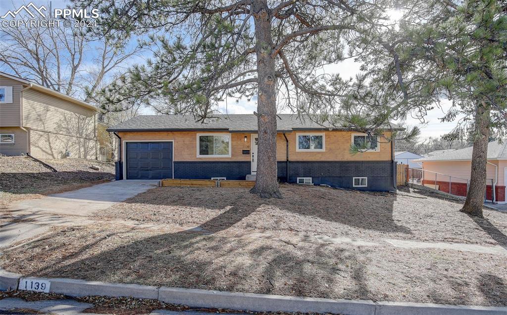 View of front of house with a garage