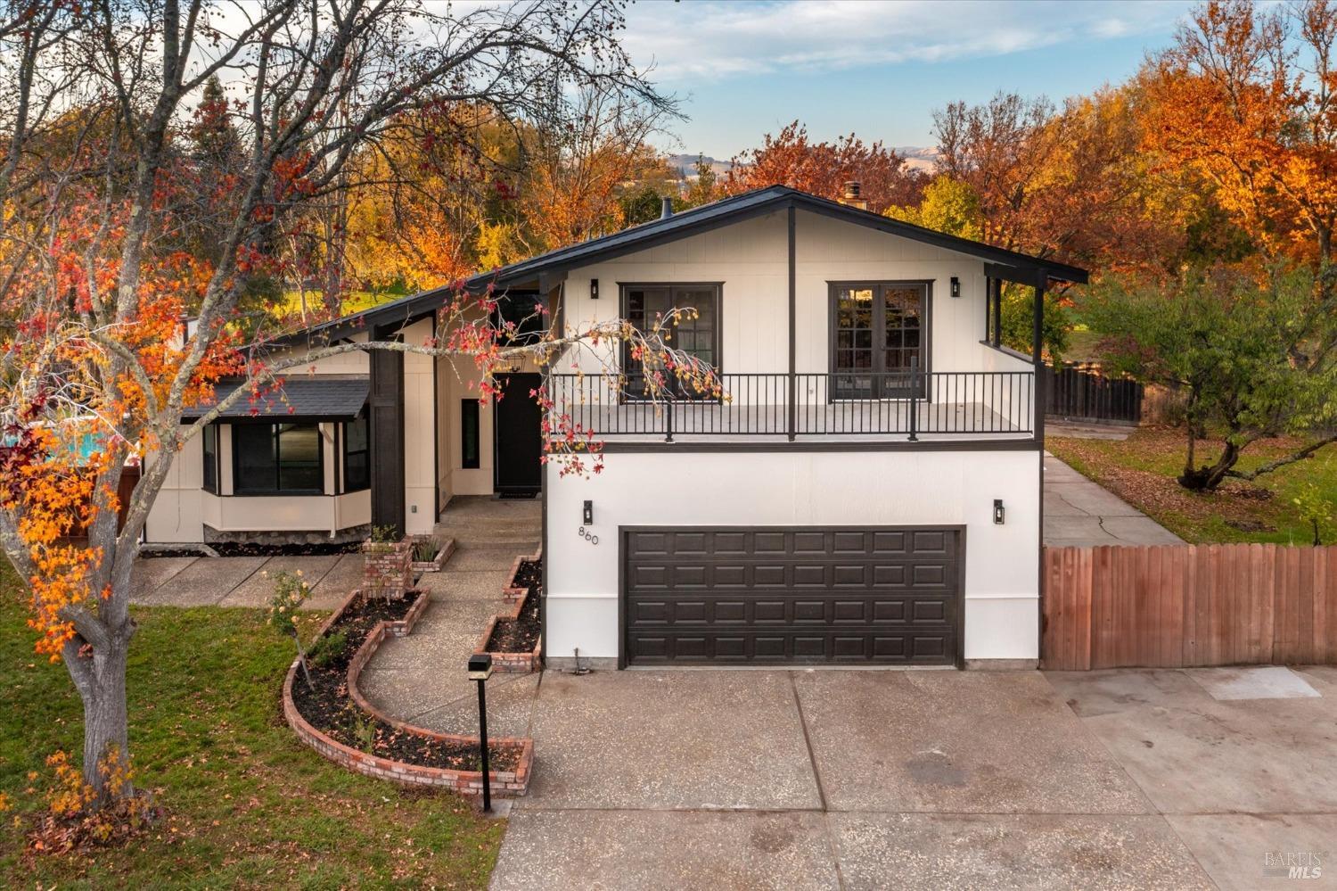 a house with trees in the background