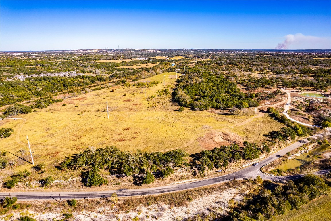 Welcome to Mesa Above Onion Creek - 10+ acres along this beloved Hill Country byway