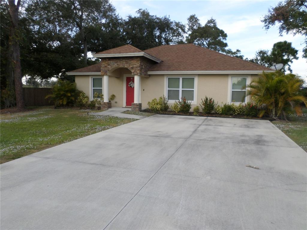 front view of a house and a yard