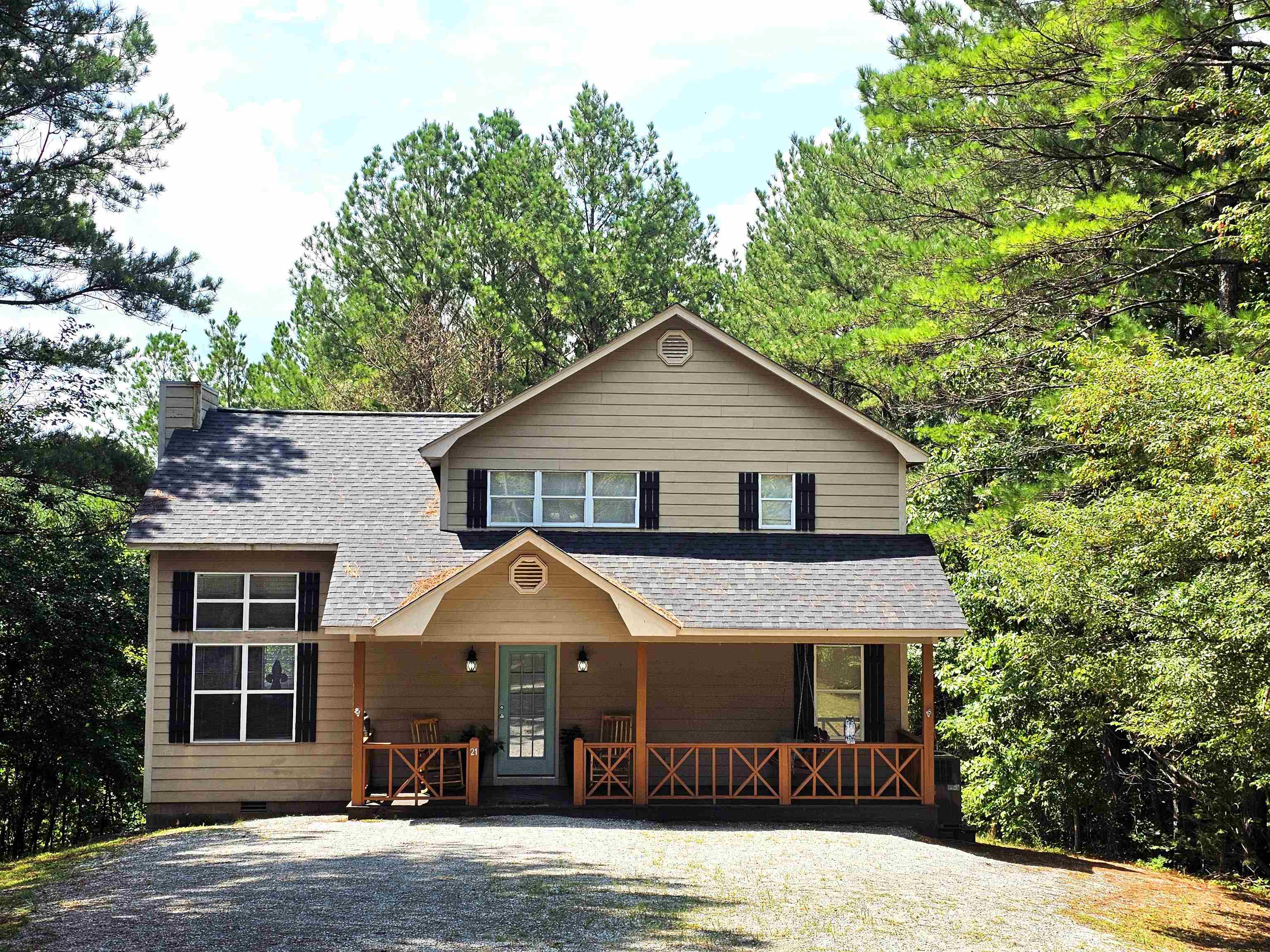 a front view of a house with a porch