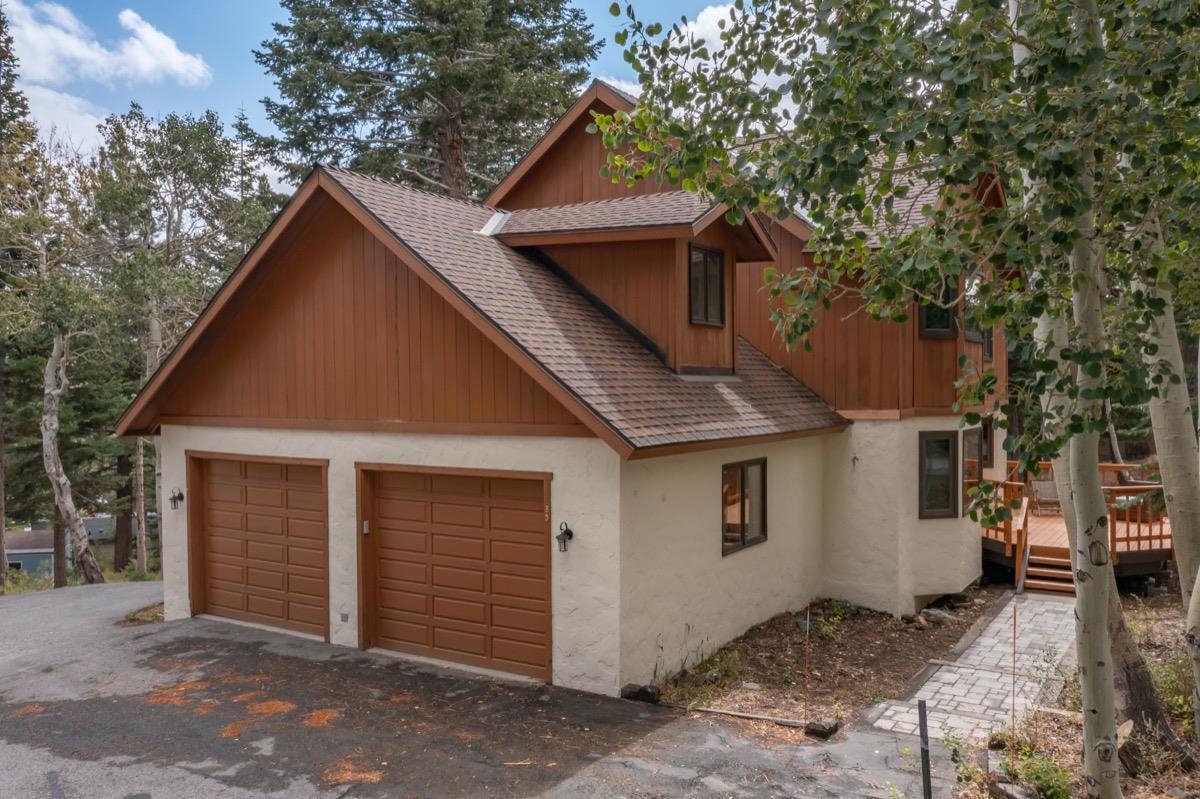 a front view of a house with a garage