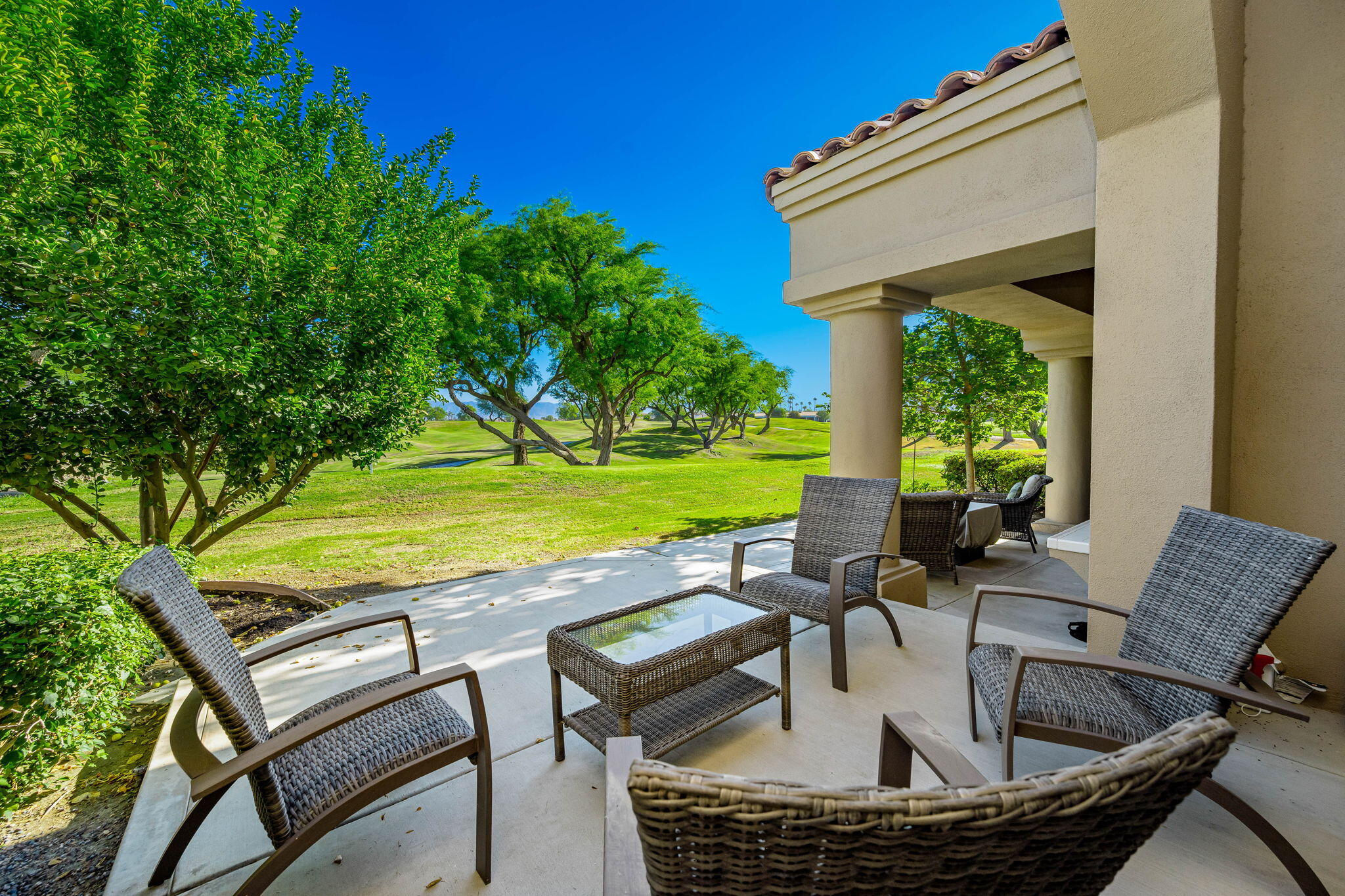 a view of swimming pool and outdoor seating