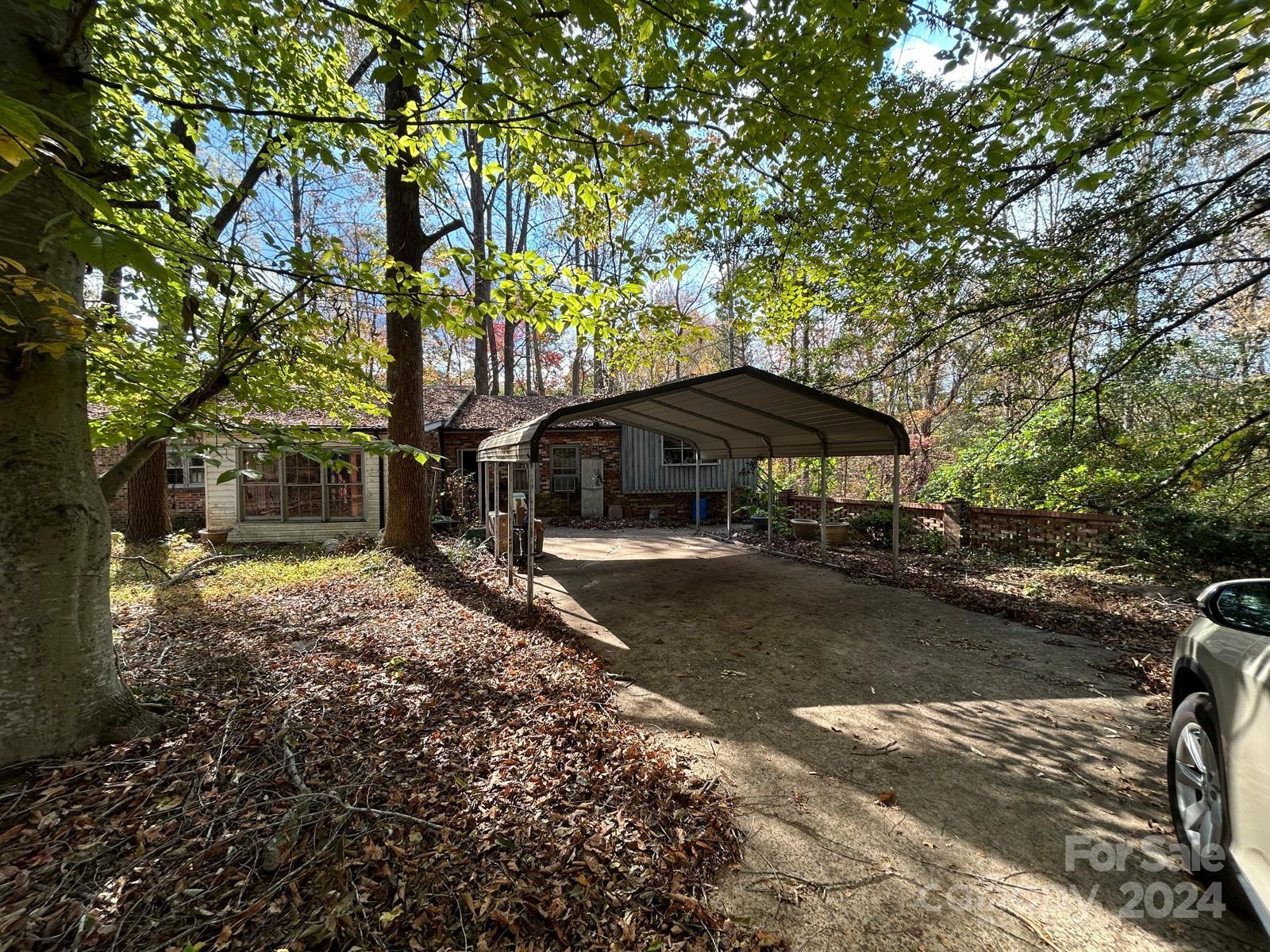 a house with trees in the background