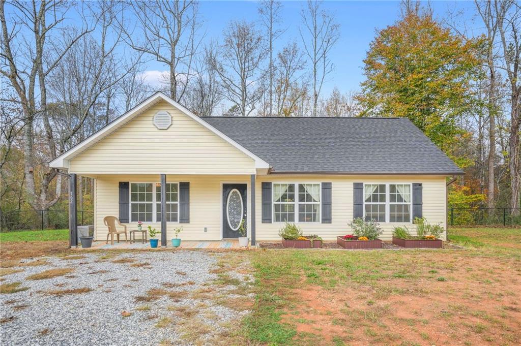 front view of a house with a yard