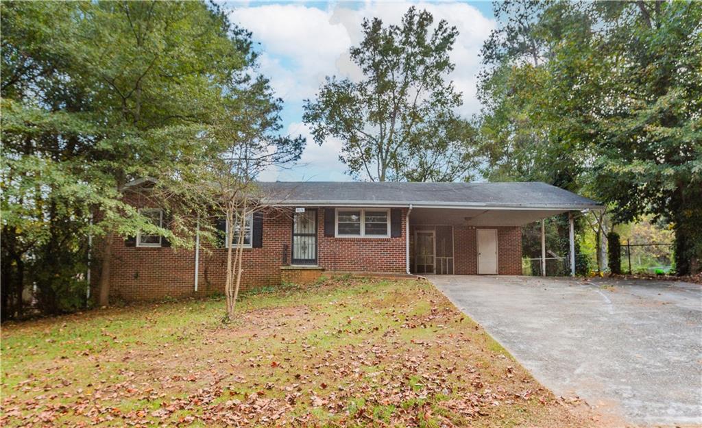 front view of a house with a yard