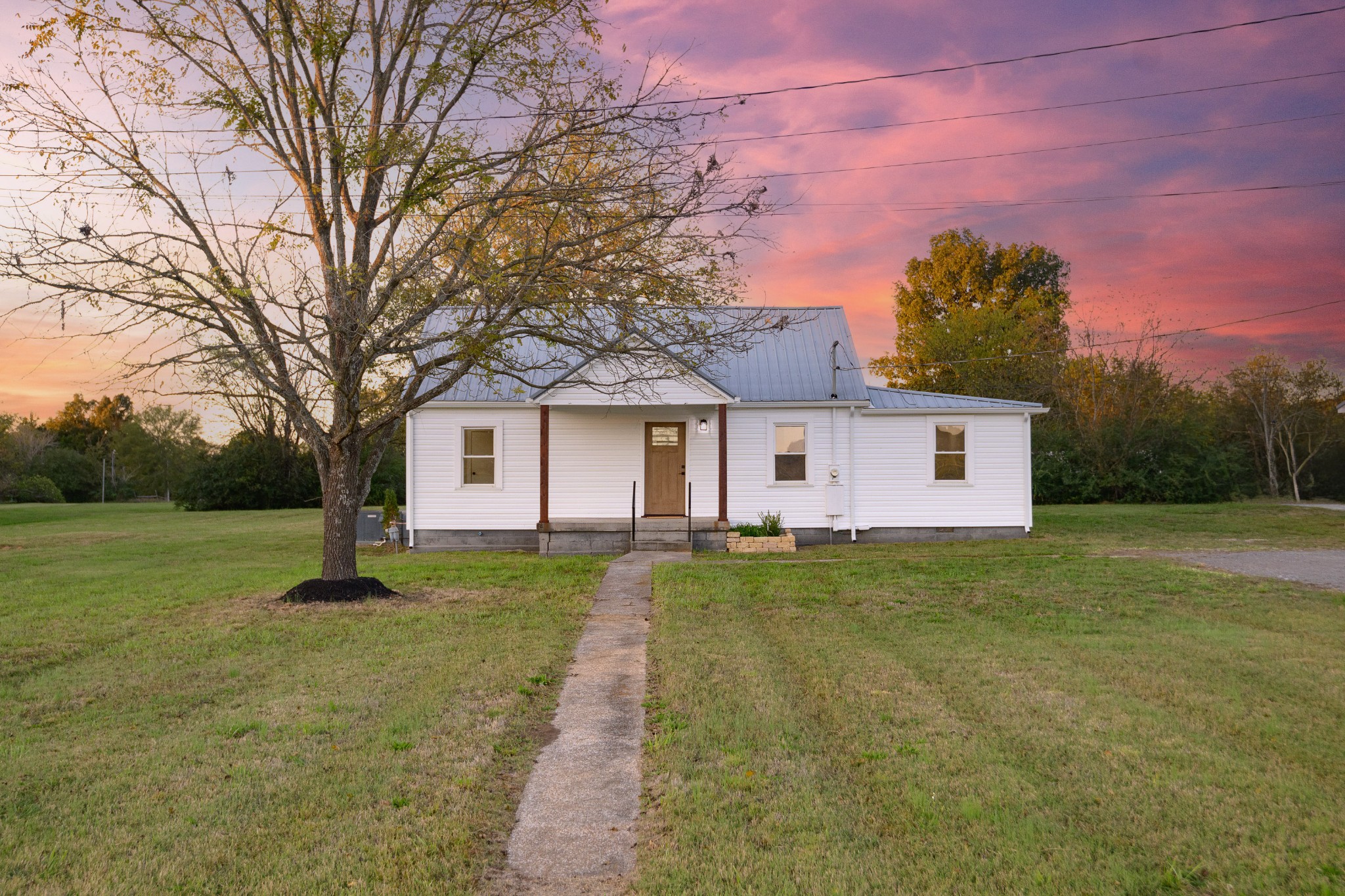 a house view with a garden space