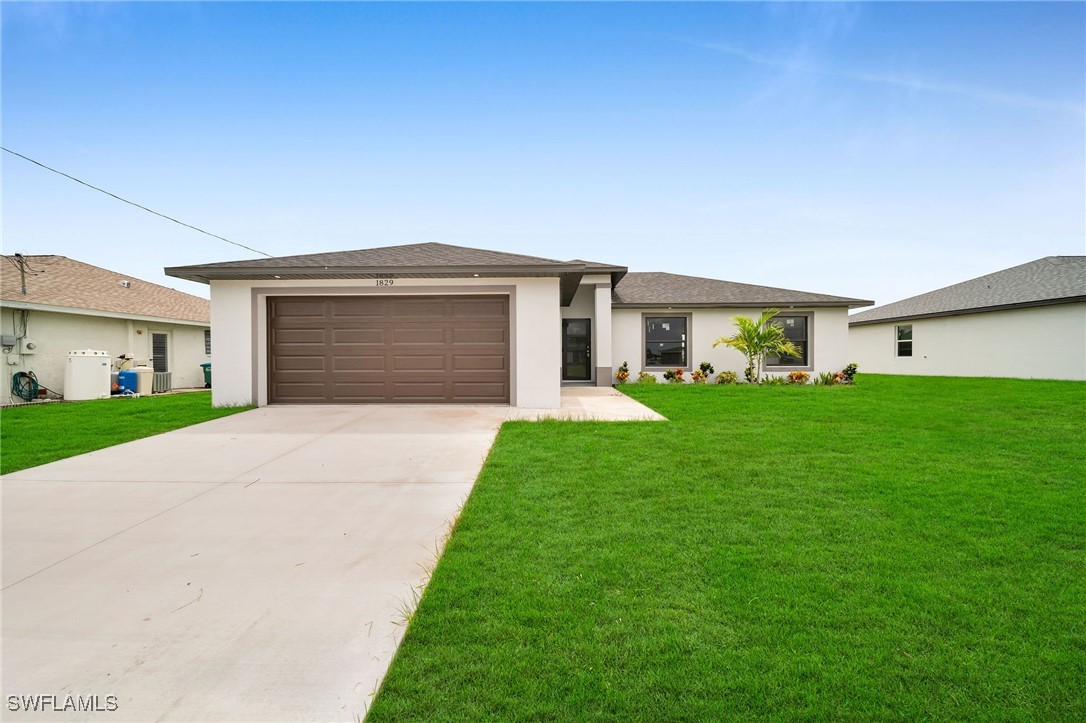 a front view of house with yard