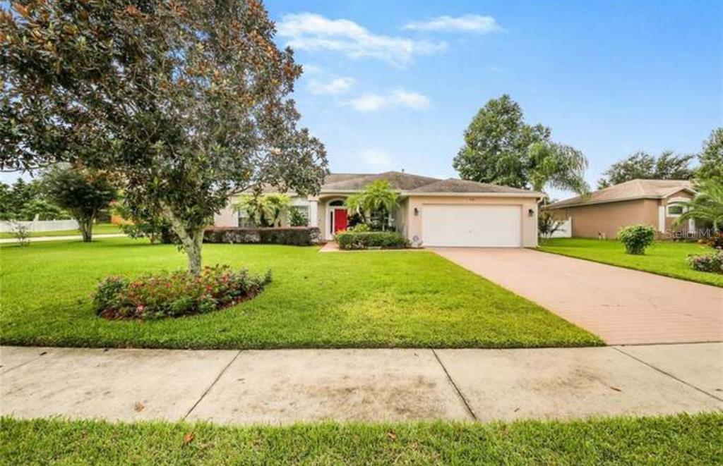 a view front of house with a yard