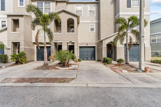 $265,000 | 4854 Tuscan Loon Drive | Palm River Townhomes